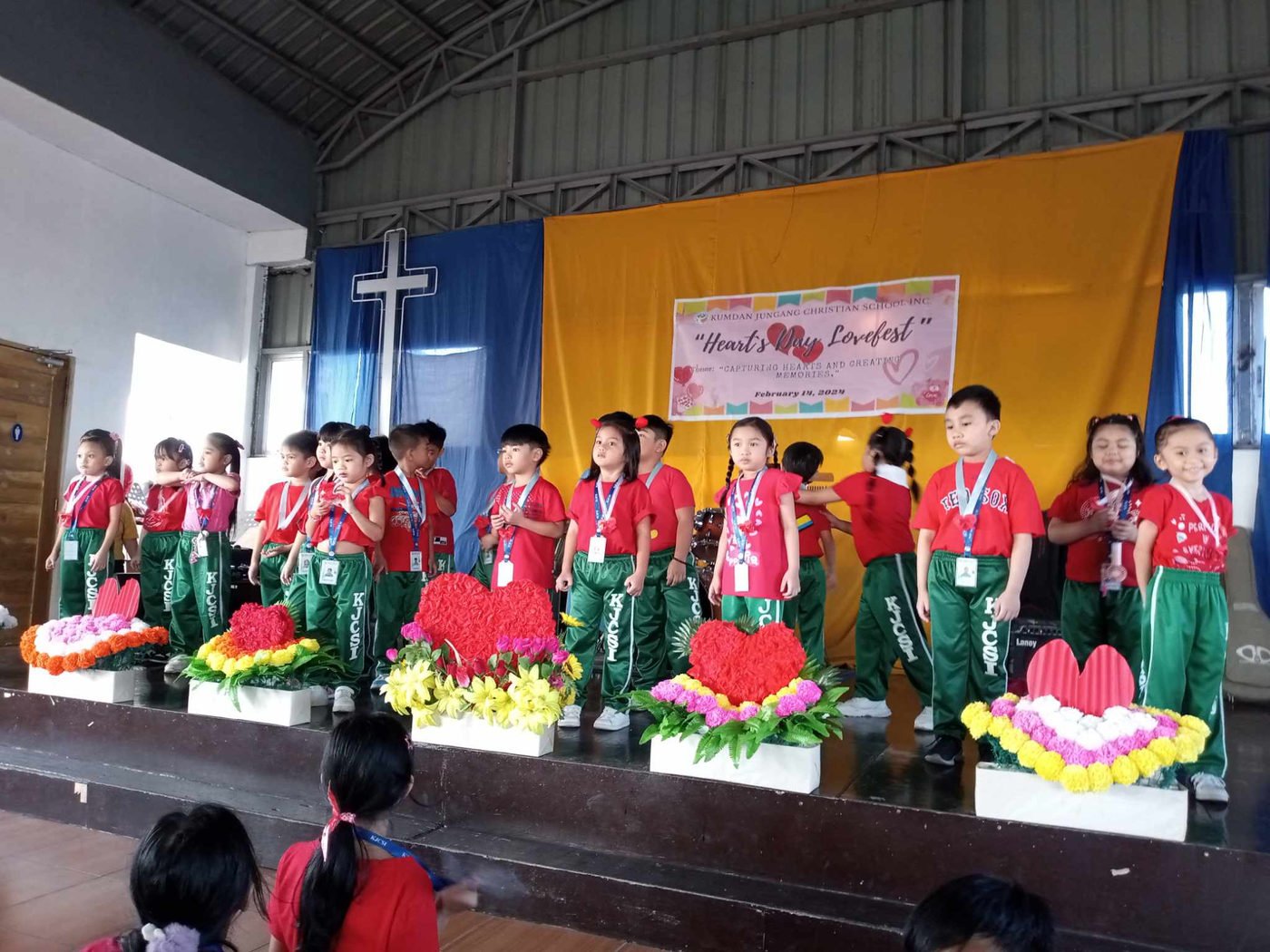 Pupils performing a stage number in costume