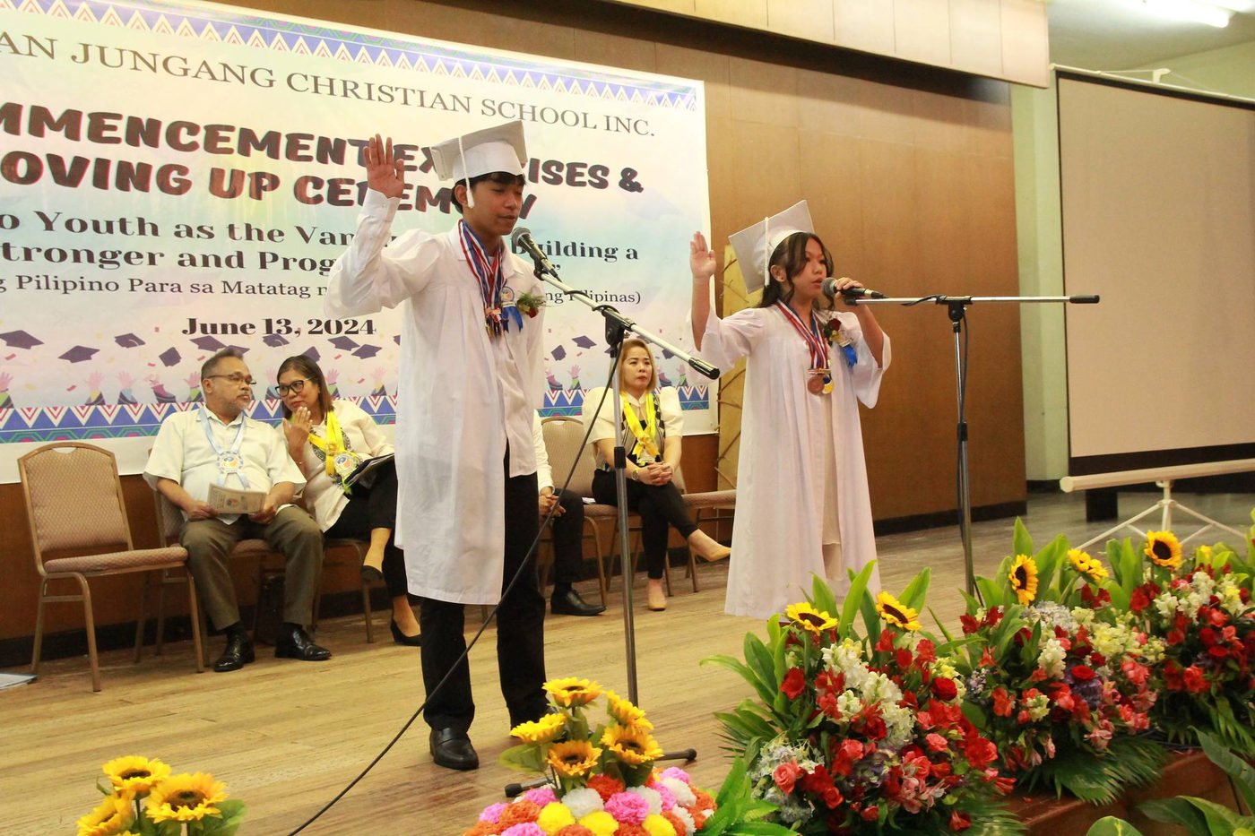 A graduate speaking at the ceremony