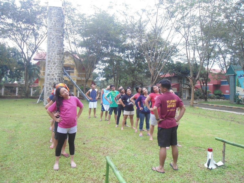 Staff playing a field game during team building