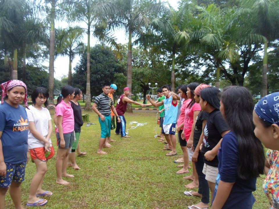 Group activity on the grass during team building
