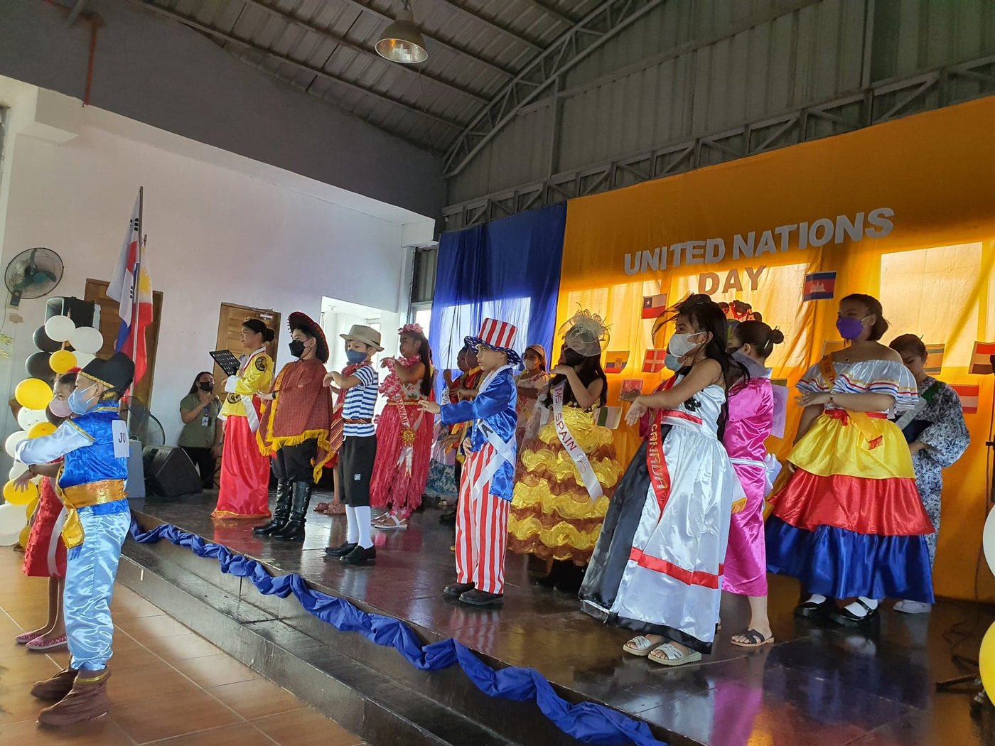 Pupils in national costumes for United Nations Day
